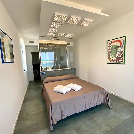 Marina Bay Suites Peschici Bagian luar foto