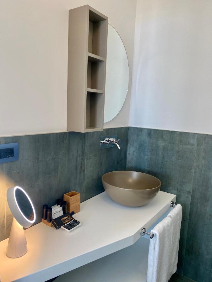 Marina Bay Suites Peschici Bagian luar foto