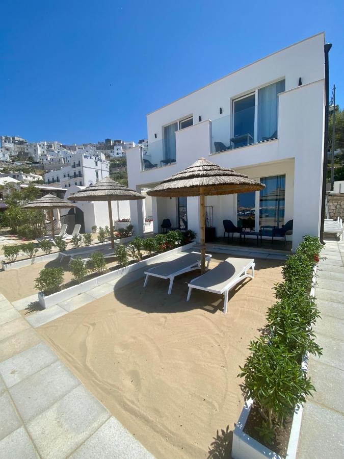 Marina Bay Suites Peschici Bagian luar foto